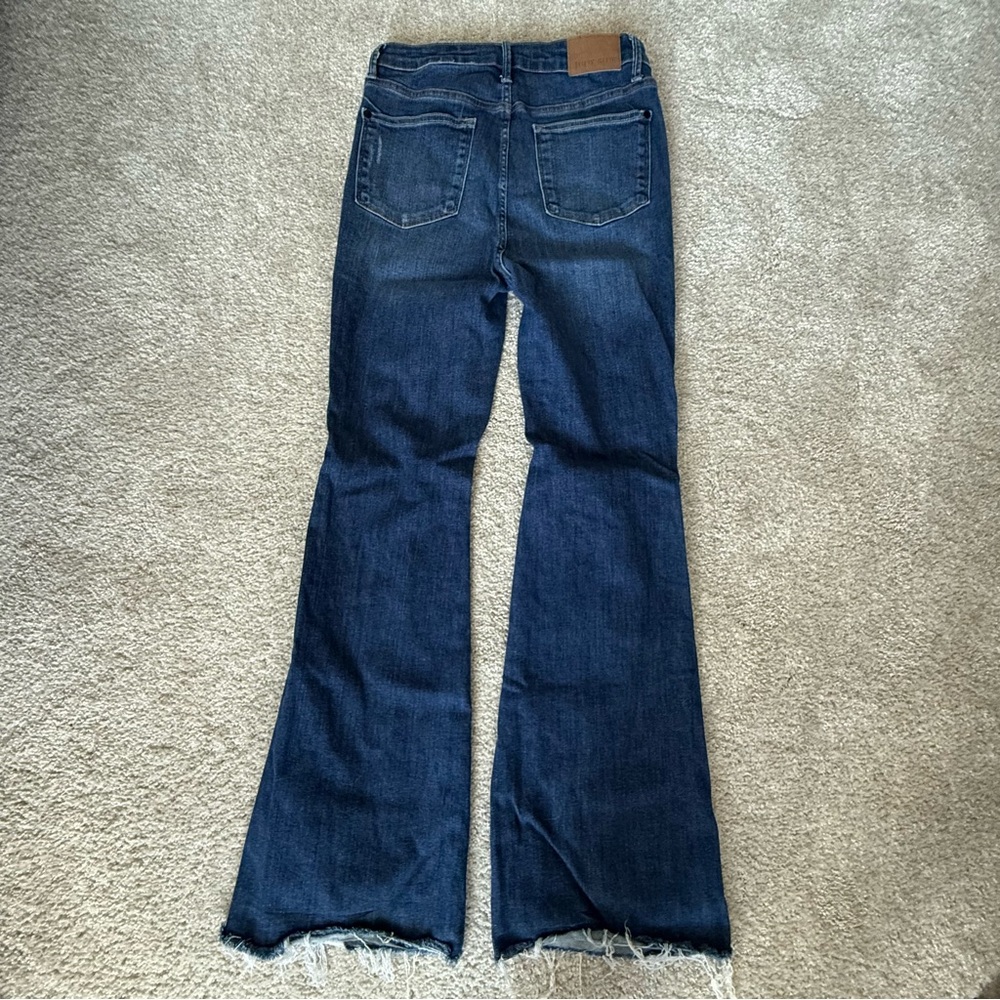Judy Blue Flare Jeans with distressing and frayed hem - Picture 6 of 8